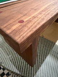 Hancrafted walnut charcuterie board with bloodwood accents.
